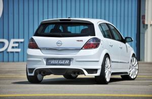 Heckschrzenansatz fr Serien Endschalldmpfer links Rieger Tuning passend fr Opel Astra H